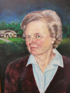 Portrait of the future Edelfried E. Hoge with their house in the background